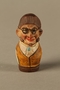Bottle stopper with a wooden finial depicting a Jewish stereotype