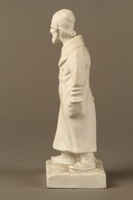 2016.184.39 left side
White porcelain figurine of a Jewish matchmaker with his umbrella

Click to enlarge