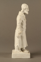 2016.184.39 right side
White porcelain figurine of a Jewish matchmaker with his umbrella

Click to enlarge