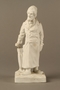 White porcelain figurine of a Jewish matchmaker with his umbrella