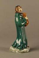 2016.184.41 right
Murano glass figure of a Jew holding a full money bag

Click to enlarge