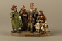 Colorful terracotta figure group of a Jewish family dressed for Sabbath
