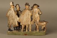 2016.184.52 back
Colorful terracotta figure group of 4 Jewish men, a boy, and a goat

Click to enlarge