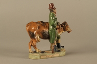 2016.184.53 right side
Terracotta figurine of a Jewish peddler with an underfed cow

Click to enlarge