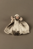 2016.184.45 front
Bisque figurine of a Jew in a white plasterer’s coat and gray boots

Click to enlarge