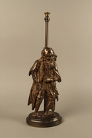 2016.184.73_a front
Cast iron Fagin lamp holding a toasting fork / trident

Click to enlarge