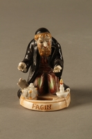 2016.184.74 front
Porcelain figure of Fagin counting his money by candlelight

Click to enlarge