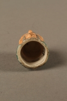 2016.184.75 bottom
Porcelain thimble in the shape of Fagin's head

Click to enlarge