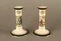 Pair of William Adams & Sons stoneware candlesticks with a scene of Oliver Twist meeting Fagin