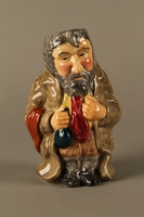 2016.184.84 front
Roy Kirkham Toby jug of Fagin holding a coin bag

Click to enlarge