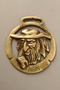 Brass horse medallion with Fagin touching his finger to his nose