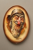 2016.184.94 front
Painted ceramic wall plaque of a grinning Fagin

Click to enlarge
