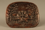 Copper painted metal dish with bas relief of 3 Jewish men on a bench