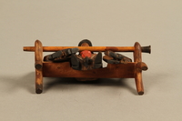 2016.184.110_a-e bottom
Tobacco pipe with decorative wooden stand of three Jews on a bench

Click to enlarge