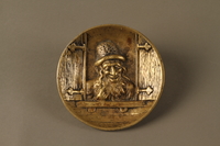 2016.184.112 front
Bronze dish of a Jewish peddler at an open window

Click to enlarge