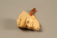 2016.184.116_a front
Meerschaum pipe with the bowl carved as a Jewish man's head, with case

Click to enlarge