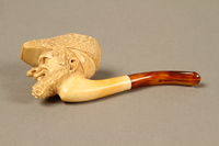 2016.184.116_a left
Meerschaum pipe with the bowl carved as a Jewish man's head, with case

Click to enlarge