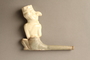White ceramic pipe with a Jewish caricature as the bowl