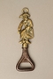 Cast metal bottle opener with a Fagin shaped handle