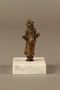 Bronze figurine of a Jewish schnorrer in his traditional long coat