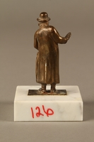 2016.184.151 back
Bronze figurine of a male Jewish matchmaker with an umbrella at his side

Click to enlarge