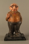 Painted wooden figurine of a Jewish banker