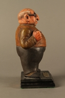 2016.184.152.1 right side
Painted wooden figurine of a Jewish banker

Click to enlarge