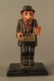 Painted wooden figurine of a Jewish peddler
