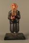 Hand carved and painted wooden figurine of a Rabbi