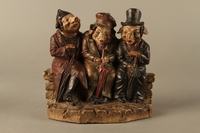 2016.184.211 front
Ceramic figure group with 3 pigs as the stereotypical 3 Jews on a bench

Click to enlarge