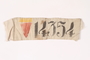 Prisoner badge with a yellow bar over a red triangle and 14354 worn by a female inmate