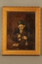 Painting of a richly dressed Jewish money lender counting his money