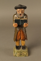 2016.184.533 front
Painted wooden figure of a Jewish man praying and holding a book

Click to enlarge