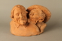 Pottery sculpture of two cheerful Jewish figures sharing a secret
