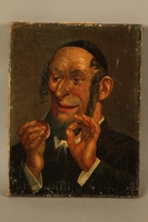 2016.184.568 front
Portrait of a Jewish man smiling at a denture with a gold tooth

Click to enlarge