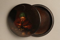 2016.184.592_a-b top
Wooden painted box with a painted image of a Jewish money lender

Click to enlarge