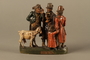 Colorful terracotta figure group of 3 Jewish men, a boy, and a goat