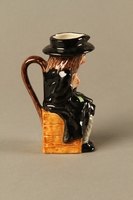 2016.184.601 right side
Character jug of Fagin sitting on a box

Click to enlarge