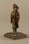 Bronze figurine of a Jewish peddler with a burlap sack