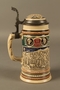 Blue, green, and brown beer stein with images of the expulsion of the Jews