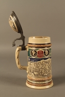 2016.184.628 open
Blue, green, and brown beer stein with images of the expulsion of the Jews

Click to enlarge