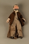 Marionette of a bearded Jewish man with a checked skull cap and coat