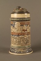 2016.184.641 front
Gray and blue beer stein with images of anti-Jewish fables and politicians

Click to enlarge