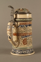 2016.184.641 3/4 view closed
Gray and blue beer stein with images of anti-Jewish fables and politicians

Click to enlarge