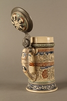 2016.184.641 3/4 view open
Gray and blue beer stein with images of anti-Jewish fables and politicians

Click to enlarge