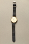 Wrist watch with cloth strap worn by Albanian rescuers