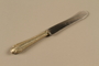 Butter knife owned by a Romanian Jewish family