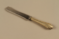2014.490.5 side b
Butter knife owned by a Romanian Jewish family

Click to enlarge