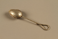 2014.490.7 side a
Tea infuser spoon owned by a Romanian Jewish family

Click to enlarge