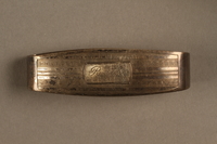 2017.311.7 side a
Silver napkin ring engraved Ruth

Click to enlarge